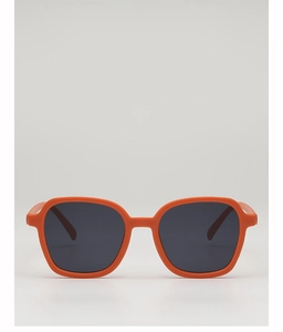 Close-up of bright orange square-frame sunglasses with dark lenses for children