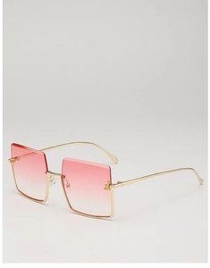 Detail view of large square metal frame sunglasses with pink gradient lenses and nose pads