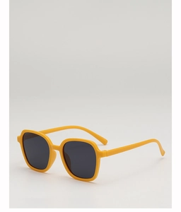 Detail view of bright yellow square frame sunglasses for kids with UV protection lenses