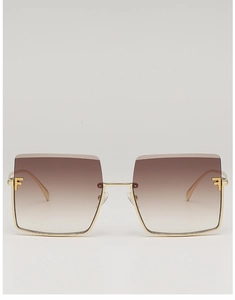 Detail of square oversized sunglasses with gradient brown lenses and gold F logo