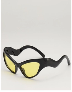 Detail of sleek black cat-eye sunglasses featuring unique wavy temples and yellow lenses