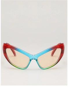 Close-up of butterfly sunglasses with gradient red to blue frame and amber lenses