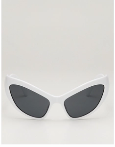 Detail of futuristic white cat eye sunglasses with thick frames and dark lenses