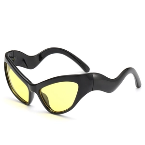 Futuristic cat-eye sunglasses with yellow lenses and unique black wavy temples
