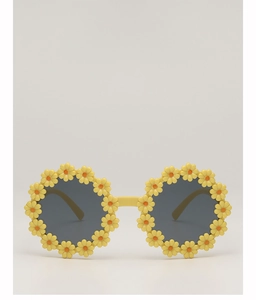 Detailed close-up of yellow daisy floral frames on cute children's sunglasses