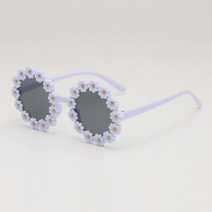 Kids daisy flower sunglasses with lavender frame and dark round lenses for summer