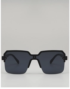 Detail of square semi-rimless sunglasses with dark lenses and silver metal rivets