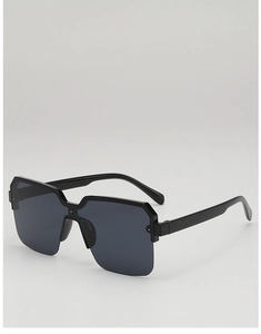Detail view of square oversized sunglasses with semi-rimless lenses and metal hinges