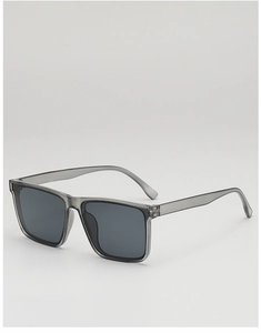 Detail of grey translucent square sunglasses with dark lenses for sun protection