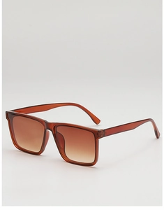 Detailed side view of amber tortoise shell sunglasses with brown gradient lenses