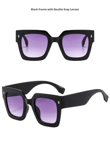 Square black sunglasses with gradient gray lenses and silver temple details