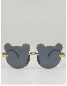 Detail of cute bear-shaped kids sunglasses with dark grey lenses and gold metal frame
