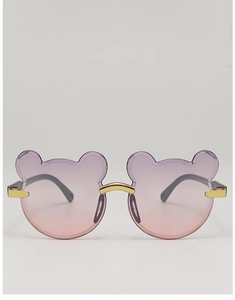Close-up of bear-shaped sunglasses with purple gradient lenses and gold bridge