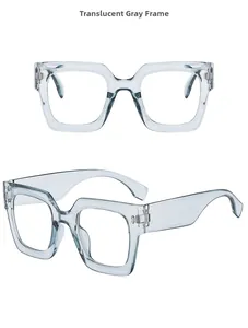 Detail view of transparent gray square frame glasses with thick geometric retro temples