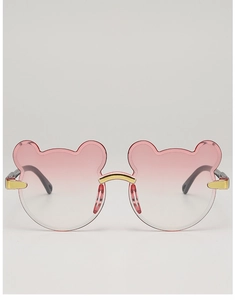Detail of cute bear-shaped pink gradient lenses with gold metal bridge for kids sunglasses