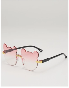 Close-up of pink gradient bear-shaped lenses and golden metal hinges on kids sunglasses