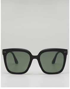 Detail of square black frame sunglasses with dark green lenses and silver rivet accents