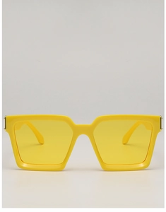 Front view of bold square yellow sunglasses with gold metal hinges and polished finish