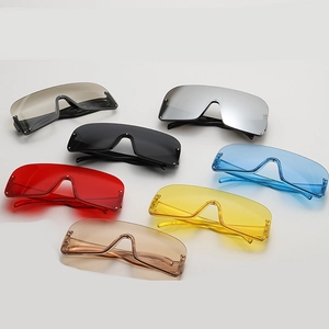Detailed top view showing seven colorful trendy oversized wrap-around rimless sunglasses