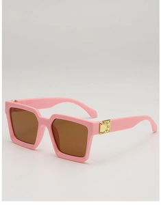 Detail of pink square sunglasses featuring golden metal accents and retro rivet hinges