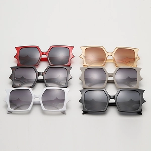 Detailed multi-color selection of oversized star-shaped butterfly sunglasses for women