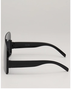 Close-up of sleek wide temples and model code 0TS0 909 on black shield sunglasses