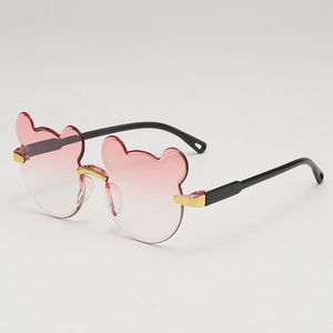 Cute bear-shaped children sunglasses with pink gradient lenses and gold bridge