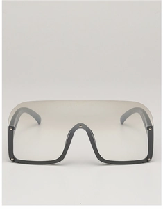Detailed front view of oversized semi-rimless sunglasses with silver rivets and grey lens
