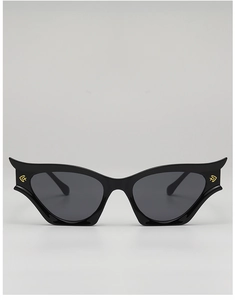 Front detail of black cat-eye sunglasses featuring unique golden winged temple accents