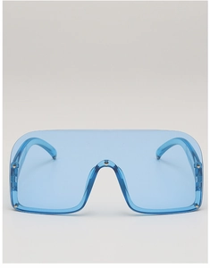 Detail of shield-style blue translucent sunglasses with decorative silver rivets