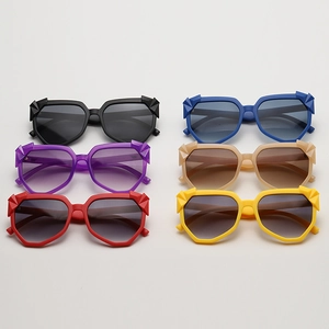 Matrix display of oversized geometric sunglasses in six vibrant fashion colors