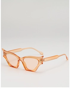 Detailed side view of orange cat-eye sunglasses featuring transparent resin frames