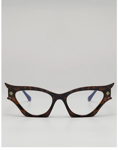 Detail view of tortoiseshell cat eye sunglasses frames with decorative gold logo accents