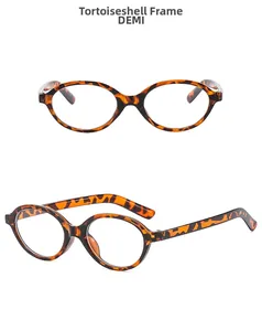 Detail view of oval demi tortoiseshell glasses frames with classic amber texture