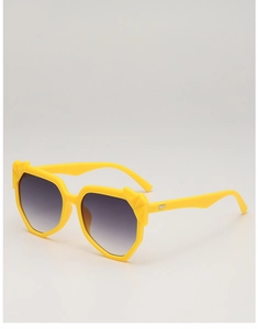 Detail of yellow geometric sunglasses featuring silver wing logo on temple arm