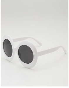 Detail of chunky white plastic frame on retro oval sunglasses with dark lenses