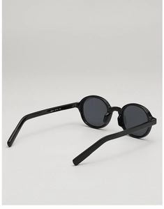 Detail of internal model number 68232 and size specifications on black oval sunglasses