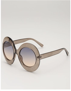 Detail of translucent grey oval frames with blue-to-brown gradient lenses at 45 degrees