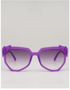 Detail of purple geometric sunglasses featuring faceted frames and gradient tinted lenses
