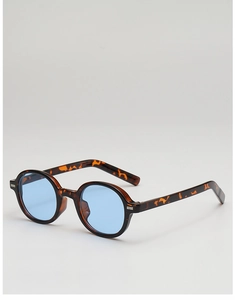 Close-up of retro tortoiseshell frames with blue lenses and metal hinge details