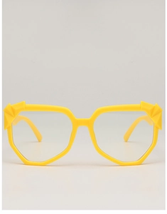 Detailed front view of bright yellow geometric sunglasses with multi-faceted frame design