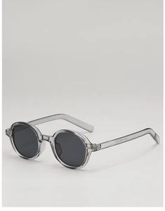 Detail view of oval grey resin sunglasses with internal frame specifications 98325