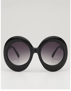 Detailed view of oversized oval sunglasses with glossy black frames and purple gradient lenses