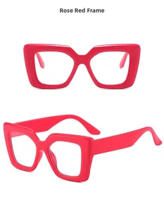 Detailed view of oversized square rose red glasses frame with clear lenses in high quality