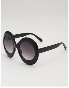 Detail view of retro oversized oval sunglasses with glossy black frame and gradient lenses