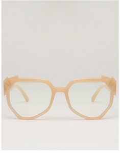 Macro shot of stylish peach geometric eyeglass frame with unique angular lens design