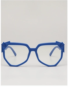 Macro detail of royal blue geometric glasses frame with modern 3D faceted temple design