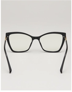 Detail of elegant black cat-eye frame showing gold metal hinges and polished finish