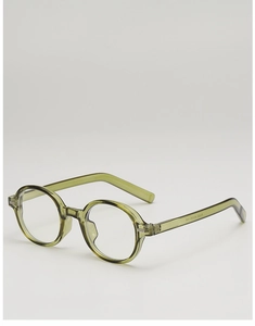 Close-up of retro oval translucent olive green eyeglass frames with detailed side view