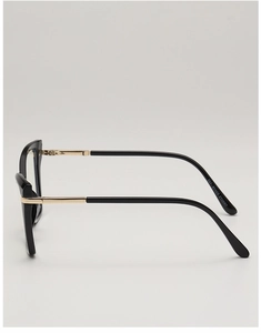 Detail of cat-eye glasses frame with black and gold metal temples and TR2013 specs